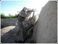 Returning fire during a battle in Southern Afghanistan.jpg
